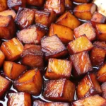 Honey Roasted Sweet Potatoes: A Simple Side Dish That Steals the Show Honey Roasted Sweet Potatoes Close-up of honey roasted sweet potatoes with caramelized glaze