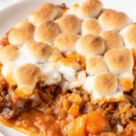 Sweet Potato Casserole with Marshmallows: Cozy, Classic, and Irresistible Sweet Potato Casserole with Marshmallows Sweet potato casserole with toasted marshmallows served on a plate